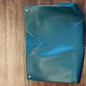 A New Day clutch with magnetic closure